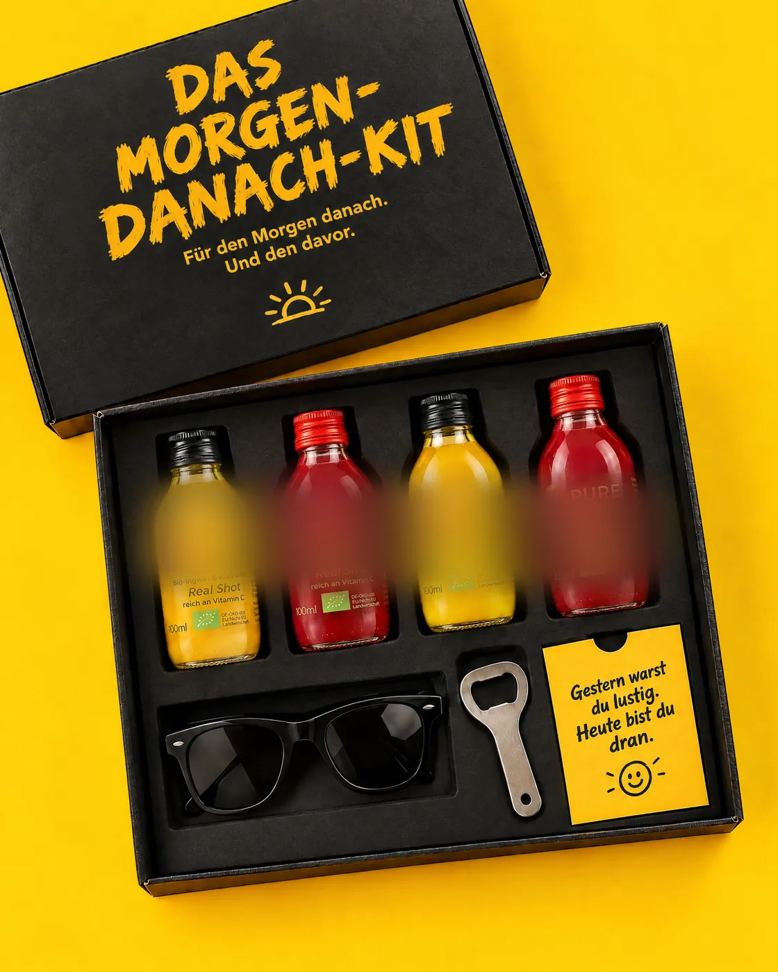 KI-Entwurf: schwarze Box „Das Morgen-danach-Kit“ mit vier Shots, Sonnenbrille und Öffner